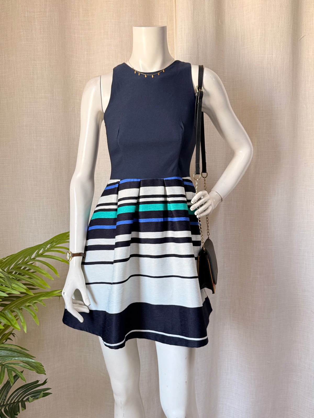 Navy Sleeveless Skater Dress with Vibrant Striped Pleated Skirt - Small